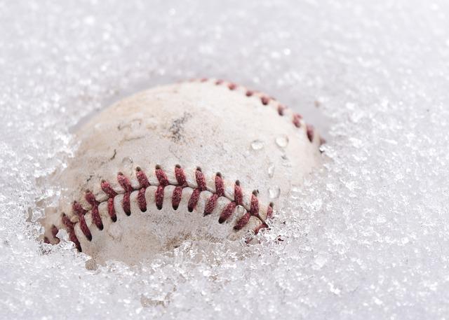 A baseball covered in snow.