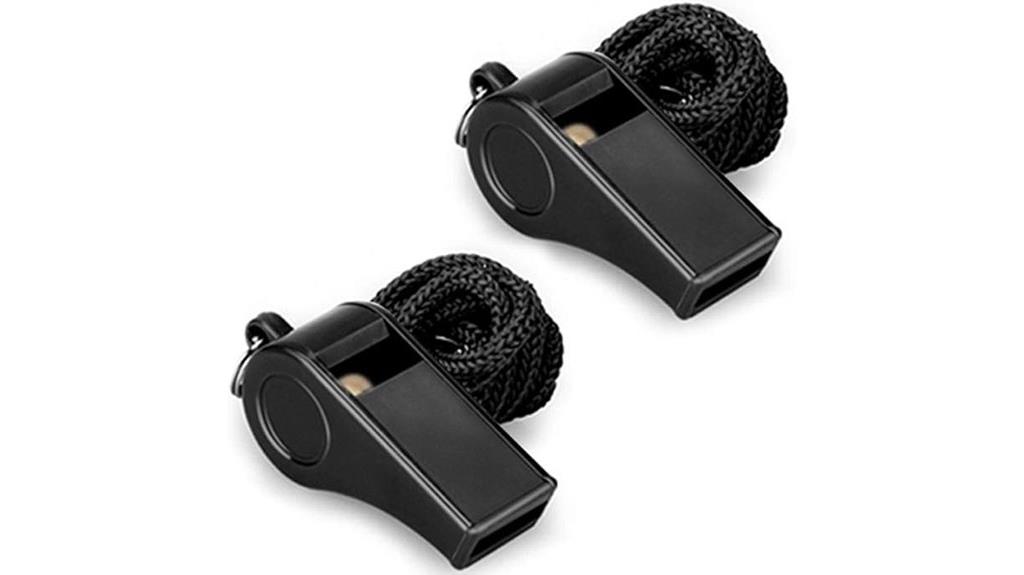 two plastic sports whistles